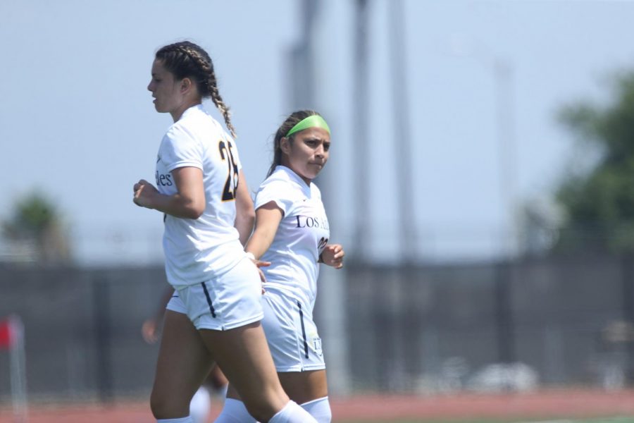 Cal state LA Golden Eagles Soccer Girls take the win over Toros, running around in their uniforms