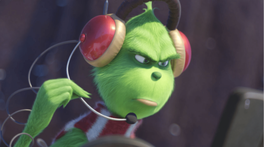 A picture of the grinch with a set of headphones.