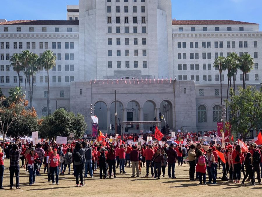 The crowd listens to the agreement made between UTLA and LAUSD. Photo By Marissa Chavez