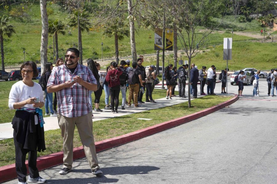 The voting and In-N-Out line wrapping past the U-SU Plaza as even more students continue to participate last Tuesday. Photo by 