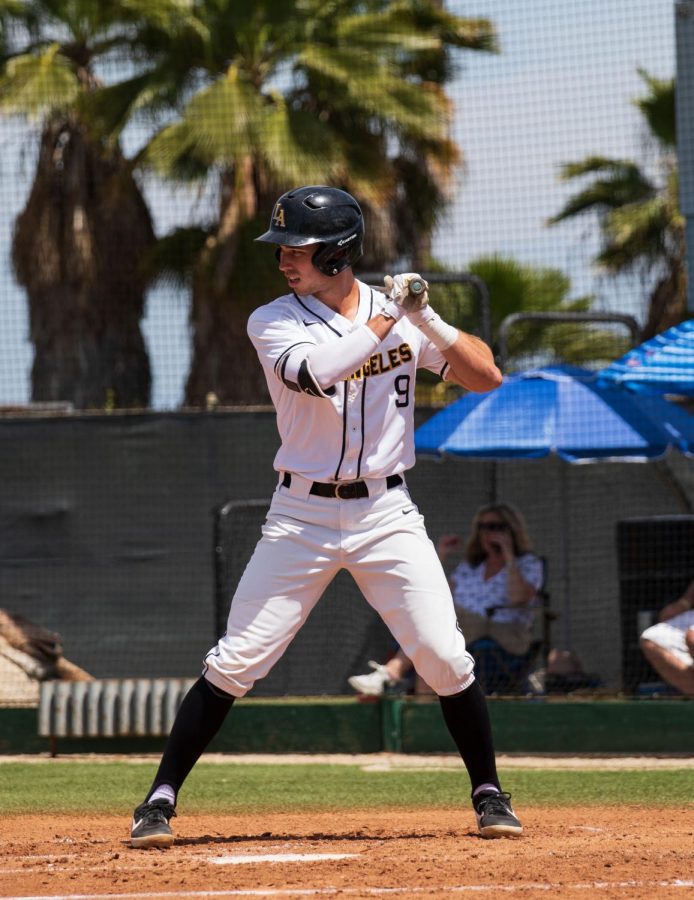 Golden Eagles team captain, Spencer Sundahl (9), takes his at-bat against the San Marcos Cougars.