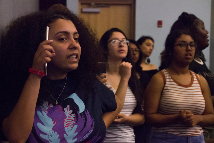 Students from the Golden Eagle Justice Coalition attend the Academic Senate meeting to represent the Resolution of No Confidence in President Covino.