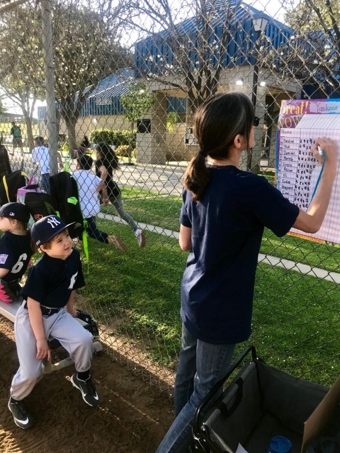 Marcello Reyes at a T-ball game. (Daniel Lindley/UT)