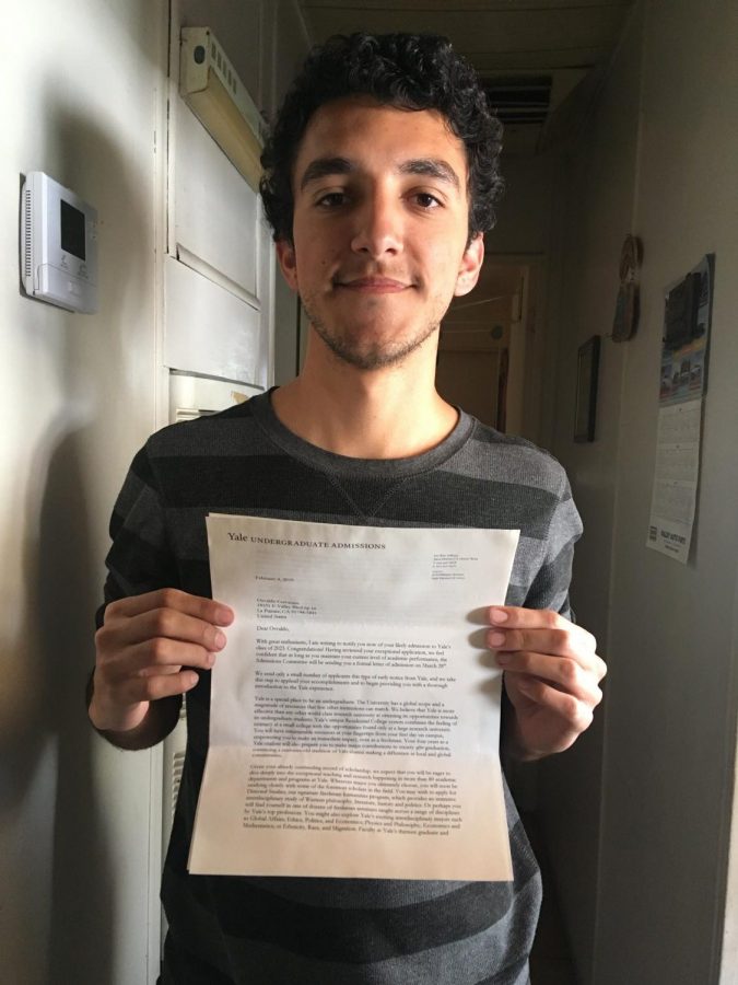 Osvaldo Cervantes holds an acceptance letter to Yale University.