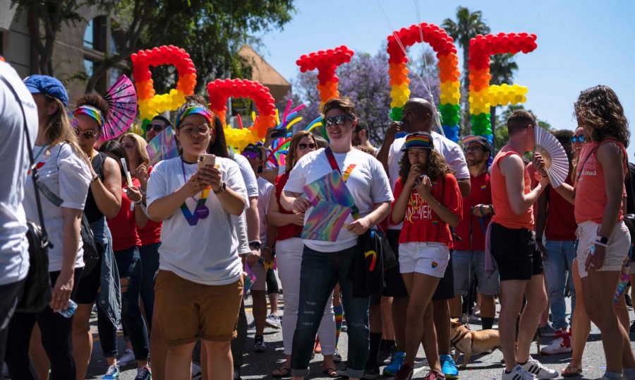 The first to go by in the Pride Parade marched in front of a big ballon Pride sign, which kicked off the parade in West Hollywood this past Sunday.