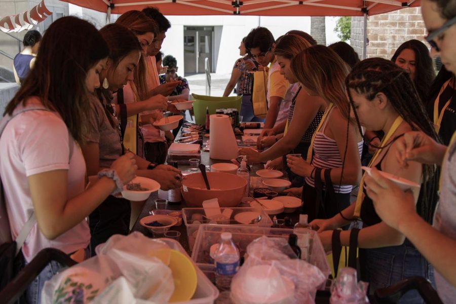 One of the main booths at the CSI Golden Summer event was a DIY bath bomb station. Students can learned how to make bath bombs from scratch using materials such as soap, glitter, and other various ingredients.