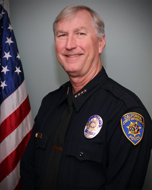 Former Director of Public Safety and Chief of Police, Rick Wall, poses for a staff photo