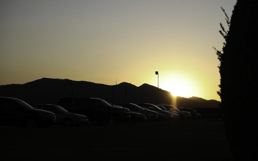 The sun sets at Forest Lawn as the memorial begins.