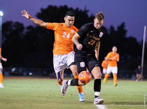 Men’s soccer has a close call