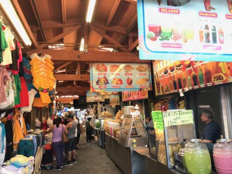 Locals shop at El Mercadito for traditional Mexican clothes and raspados. (Meghan Bravo/UT)