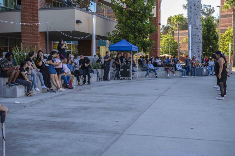 Cal State LA cheerleaders performing a routine in front of attendees during the celebration of the 45th Anniversary of the University Student Union last Thursday.