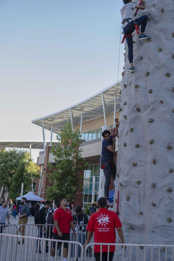 Rock climbing was a favorite attraction of the evening during the celebration of the 45th anniversary of the University Student-Union at Cal State LA last Thursday.