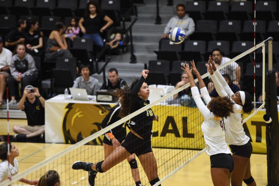 Victoria Duarte attempts to spike the ball against Cal State Dominguez Hills. Cal State LA defeated the toros 3-1.
