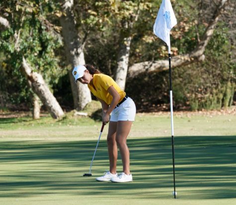 Morgan Sjoerdsma concentrates on a put during the DII West Region Preview hosted by Cal State San Marcos. Cal State LA women's golf placed 14th place overall out of 17 teams total.