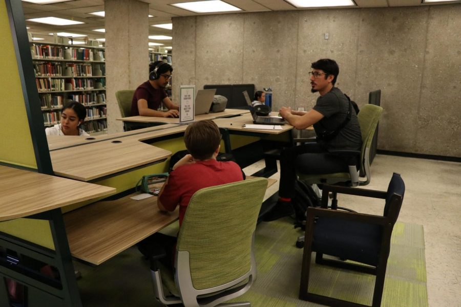 New multilevel desks are tested by students in the north library, allowing for students to sit in different ways depending on what they find comfortable.
