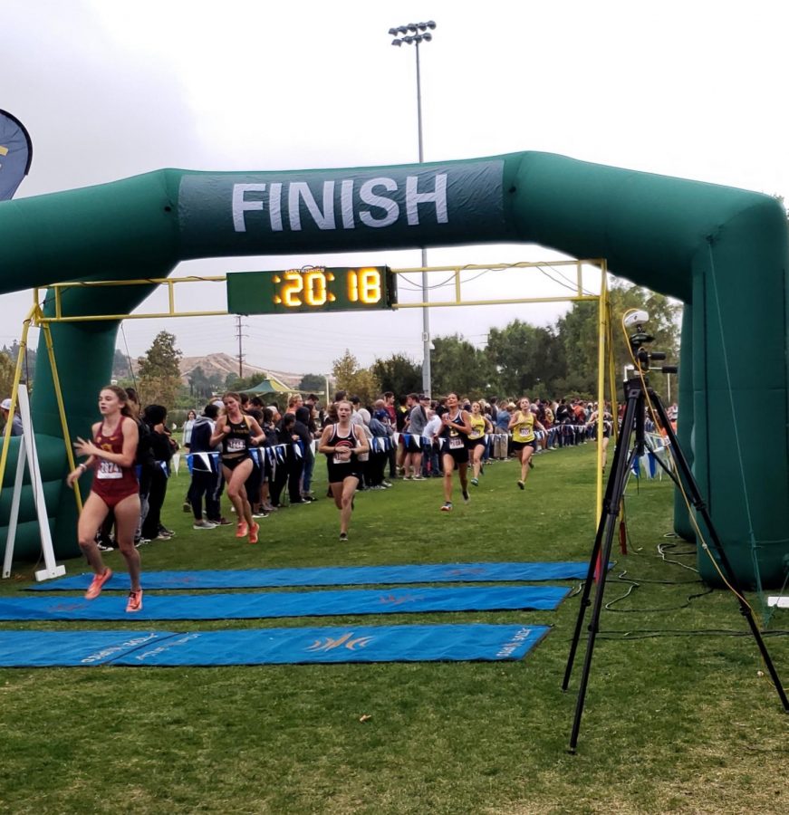 Rebeca Harris From the Womens Cross Country Finishing the race in28 minutes and 18 seconds.