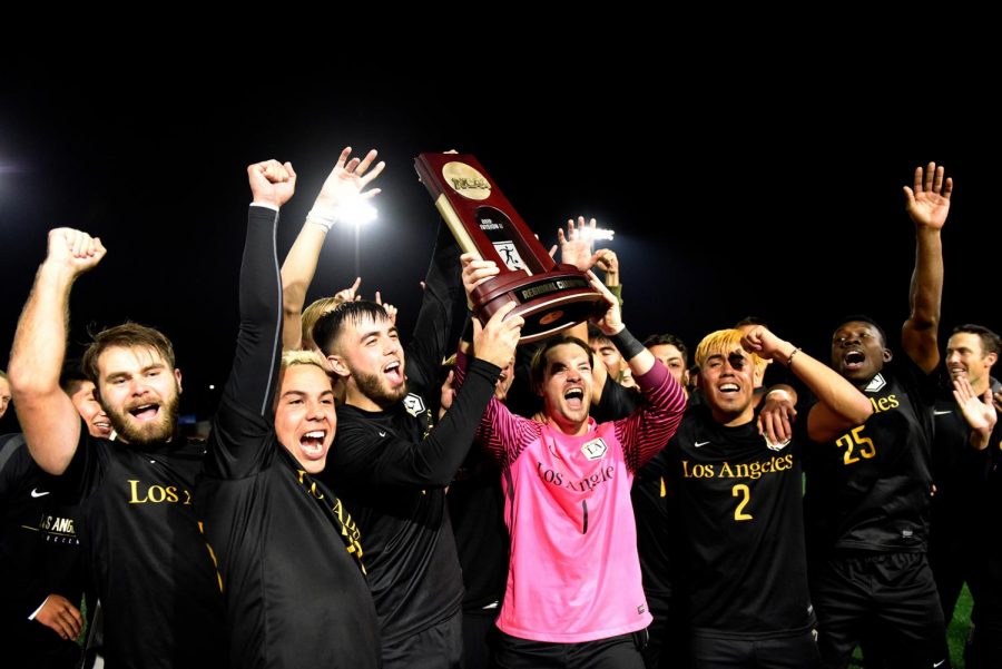 Cal State LA men’s soccer team celebrate winning the NCAA quarterfinals with their own trophy. Cal State LA will transition to the NCAA Championship semifinal in Pittsburgh, Pennsylvania.