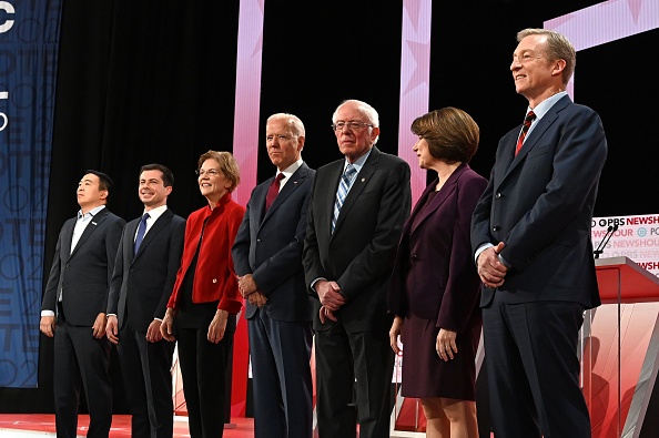 (From left to right) Democratic presidential hopefuls, entrepreneur Andrew Yang, Mayor of South Bend, Indiana Pete Buttigieg, Massachusetts Senator Elizabeth Warren, former Vice President Joe Biden, Vermont Senator Bernie Sanders, Minnesota Senator Amy Klobuchar and businessman Tom Steyer participate in the sixth Democratic primary debate of the 2020 presidential campaign season co-hosted by PBS NewsHour and Politico at Loyola Marymount University in Los Angeles, California on December 19, 2019.