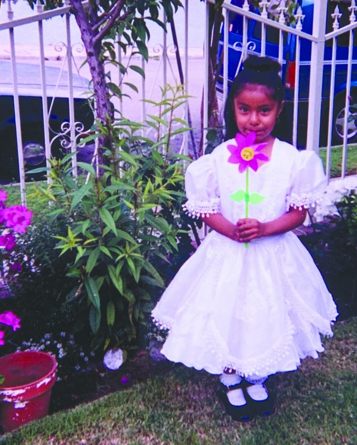 Rosio Flores was dressed in white at age 3 in South Central L.A. on the day of her presentación, a religious ceremony.