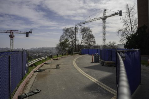 A part of Circle Drive is fenced off near King Hall for the construction of an elevator platform.