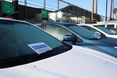The Waivecars displaying their out of service signs sit unused as the new semester begins.