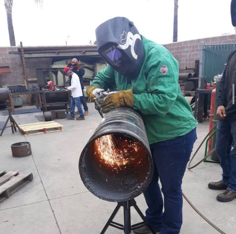 A student at Mt. San Antonio College's welding program is shown cutting pipe. This was taken before the facility was closed.