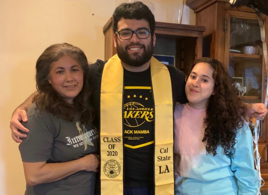 Darwin Lopez is pictured with his mother and sister.