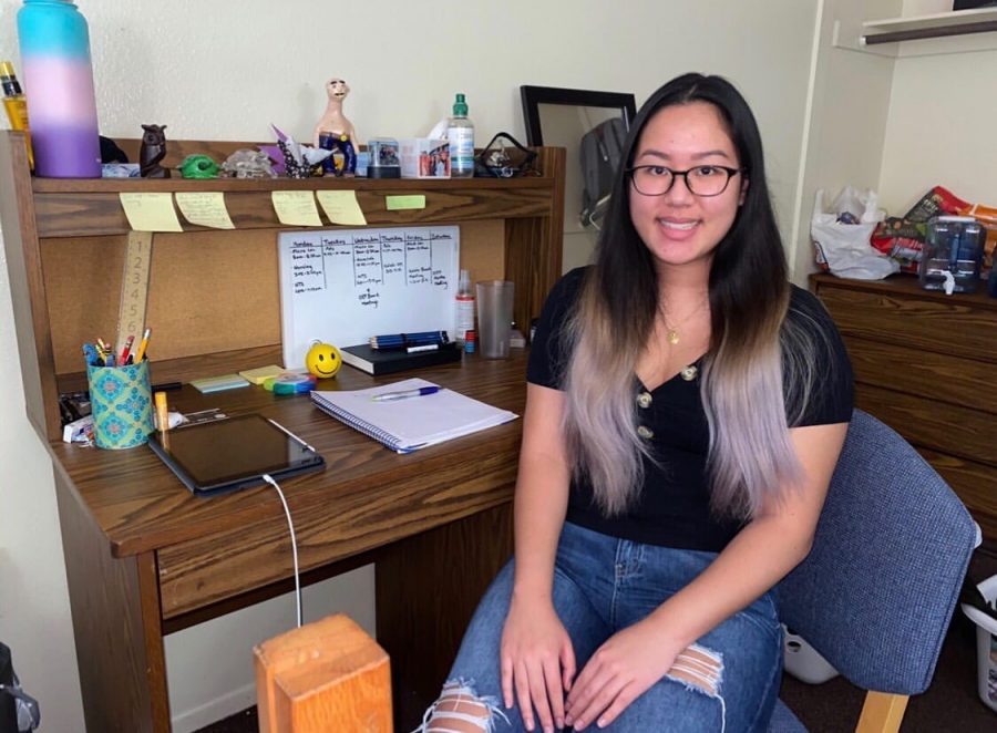 Summer Szeto sits at her work station in the Cal State LA dorms. With no family around, it’s the only place she can call her own in the state of California. Photo courtesy of Summer Szeto. This photo was coached by the reporter Joshua Letona.