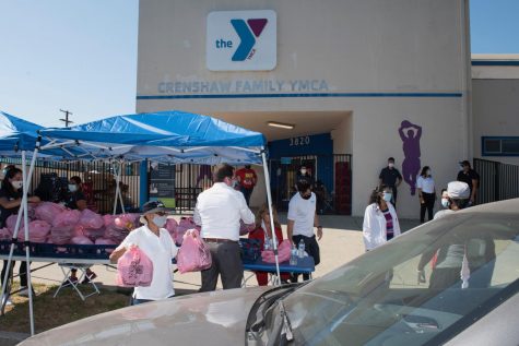 Cal State LA partnered with the Crenshaw Family YMCA to assist families with a food drive. Photos courtesy of Belen Vargas. Photo by Robert Huskey.