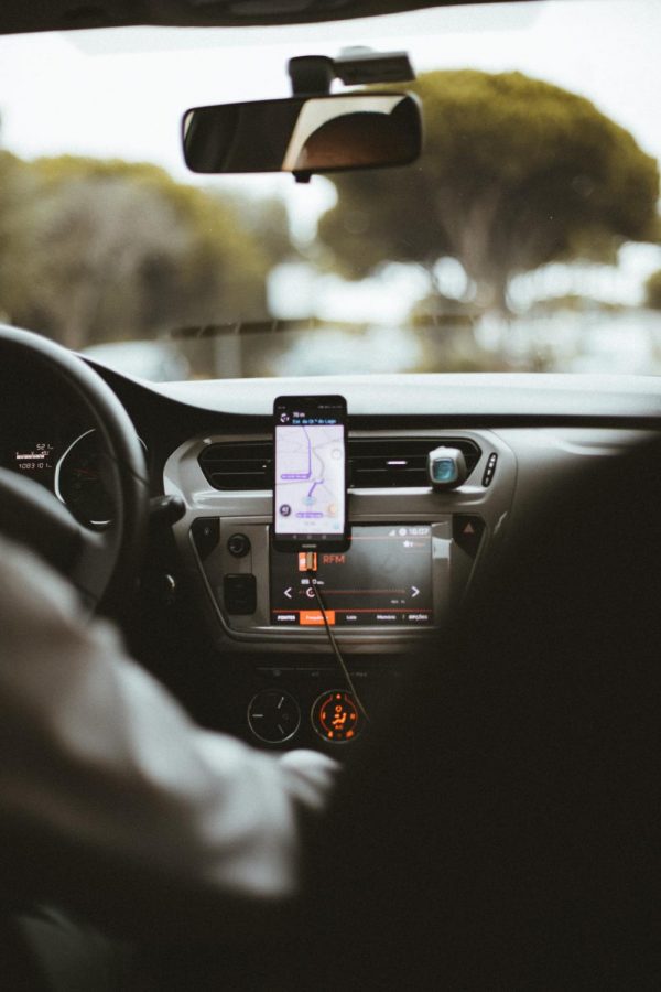 Photo of rideshare driver by Humphrey Muleba courtesy of Unsplash