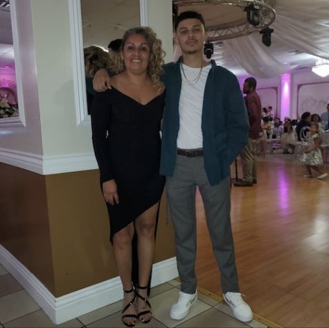 A mother and a son at a party.