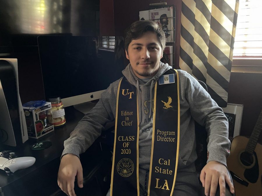 portrait+of+a+guy+wearing+his+graduation+sash