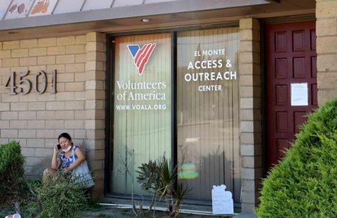 A woman sits in front of the El Monte Access Center located on Santa Anita in El Monte, California on Sept. 14, 2021. Photo by Victoria Ivie