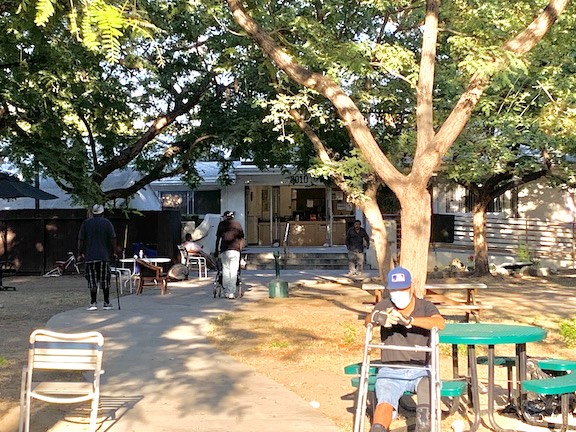 Residents of Illumination Foundation enjoying time outside by (Braylin Collins,_UT)