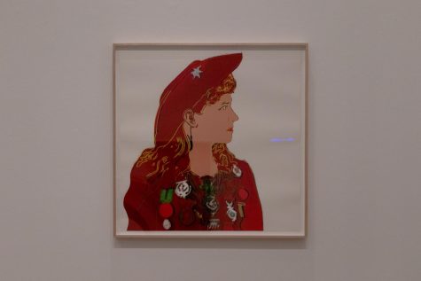 Photo displays Andy Warhols' Annie Oakley screenprint. 