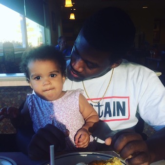 A Photo of Braylin Collins and his daughter Evelynn (Braylin Collins/UT Community News)