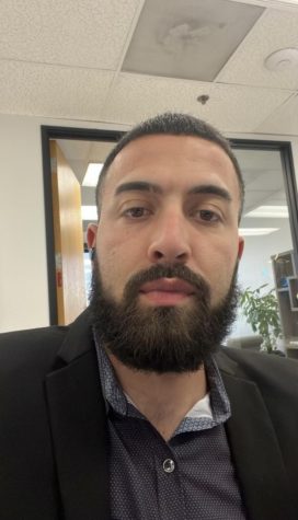 headshot of man with beard