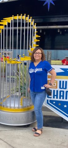 Jodi Moreno in dodger shirt posing for a photo.