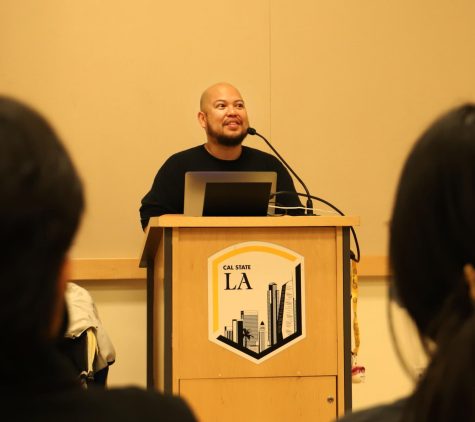 Dr. Anthony Ocampo discussing his book to people