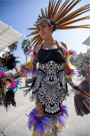 A dancer dressed in festive outfit