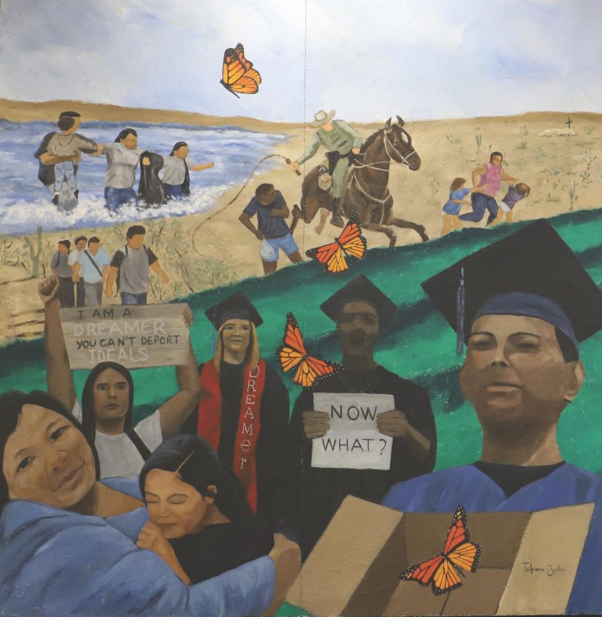 Mural+painting+featuring+students+and+the+obstacles+they+had+to+overcome+being+a+DACA+recipient+or+dreamer.
