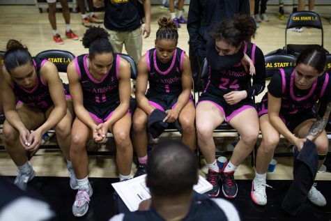 CSULA head coach Torino Johnson and players during a timeout during their home game against Sonoma St. at University Gym on Thursday, Feb. 23, 2023. The Golden Eagles would go on to beat the Seawolves 61-58. Photo by Xavier Zamora.