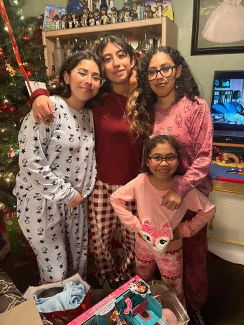 Xitlali Tenorio (far right) and her younger sisters during Christmas time. Photo courtesy of Tenorio.
