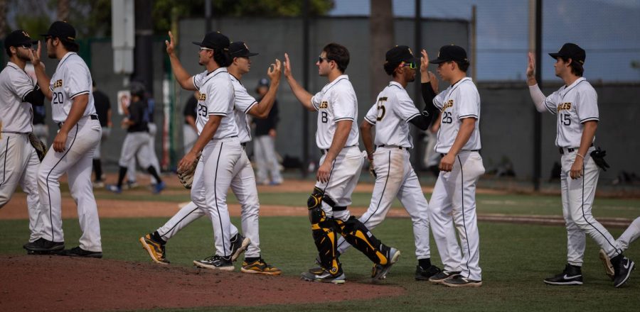 The Golden Eagles celebrate their 6-5 win over Cal State San Marcos in game one of a doubleheader sweep on Saturday, March 18, 2023, at Reeder Field. Photo by Xavier Zamora.