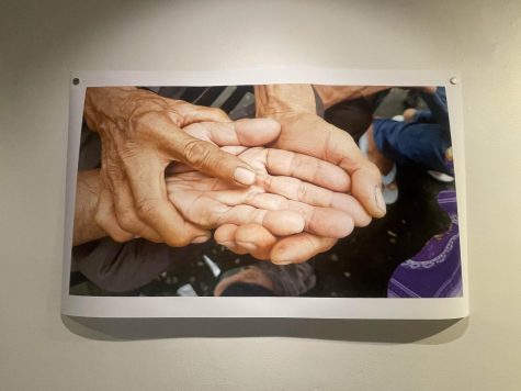 Nguyen captured a "touching moment" of his cousin getting his palm read. Photo by Tristan Longwell.