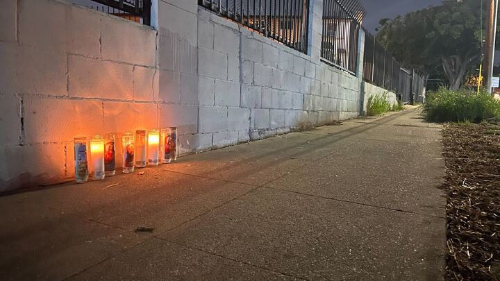 Candles lit in honor of Edgar Aguirre, who was shot near campus on April 1 weekend, was Austin Maces roommate on campus. Photo by Will Baker.