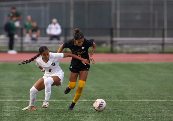 Cal State LA defender Destiny Moedano steals the ball from Azusa Pacific’s Aubrey Dunaway during their 0-0 draw against Azusa Pacific at University Stadium on Saturday, September 17, 2023.