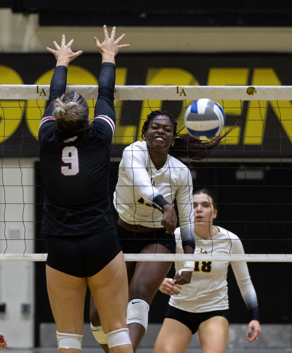Golden Eagle Haley Roundtree spikes the ball during their 3-0 win over Chico State at the University Gym on Friday, September 15, 2023.
