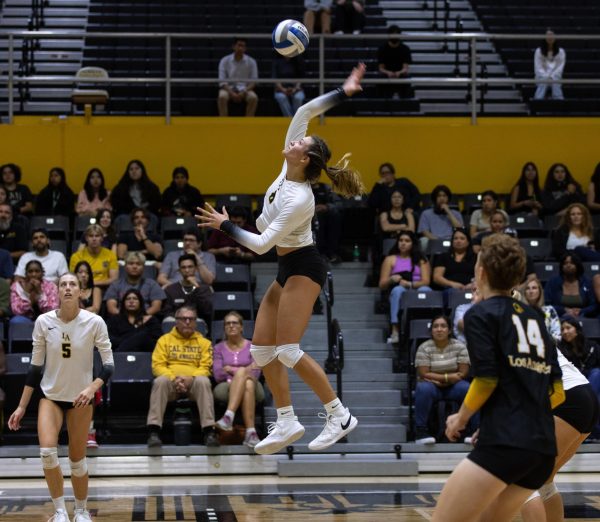 Emily Elliott spikes the ball during the Golden Eagles’ 3-0 win over Chico State at the University Gym on Friday, September 15, 2023.