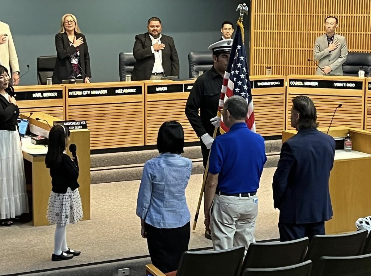 Monterey Park City Council doing the pledge of allegiance, before discussing air pollution. 